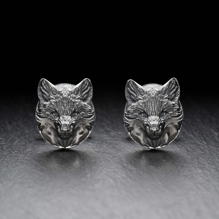 May include: A pair of silver fox head cufflinks. The cufflinks are round and feature a detailed fox head design. (etsy image id: 7689621560)