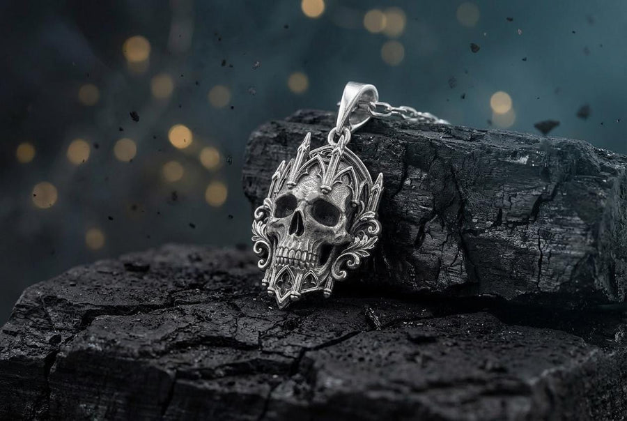 This macro image highlights the masterful texturing of the solid 925 sterling silver casting. The artisan has beautifully captured the smooth, anatomical curves of the organic skull, contrasting them against the rigid, geometric lines of the gothic tracery and cathedral spires. A deep sulfur patina treatment provides permanent matte black shadows, giving this wearable sculpture the rugged, weathered patina of a genuine historical artifact. (etsy image id: 7979410208)