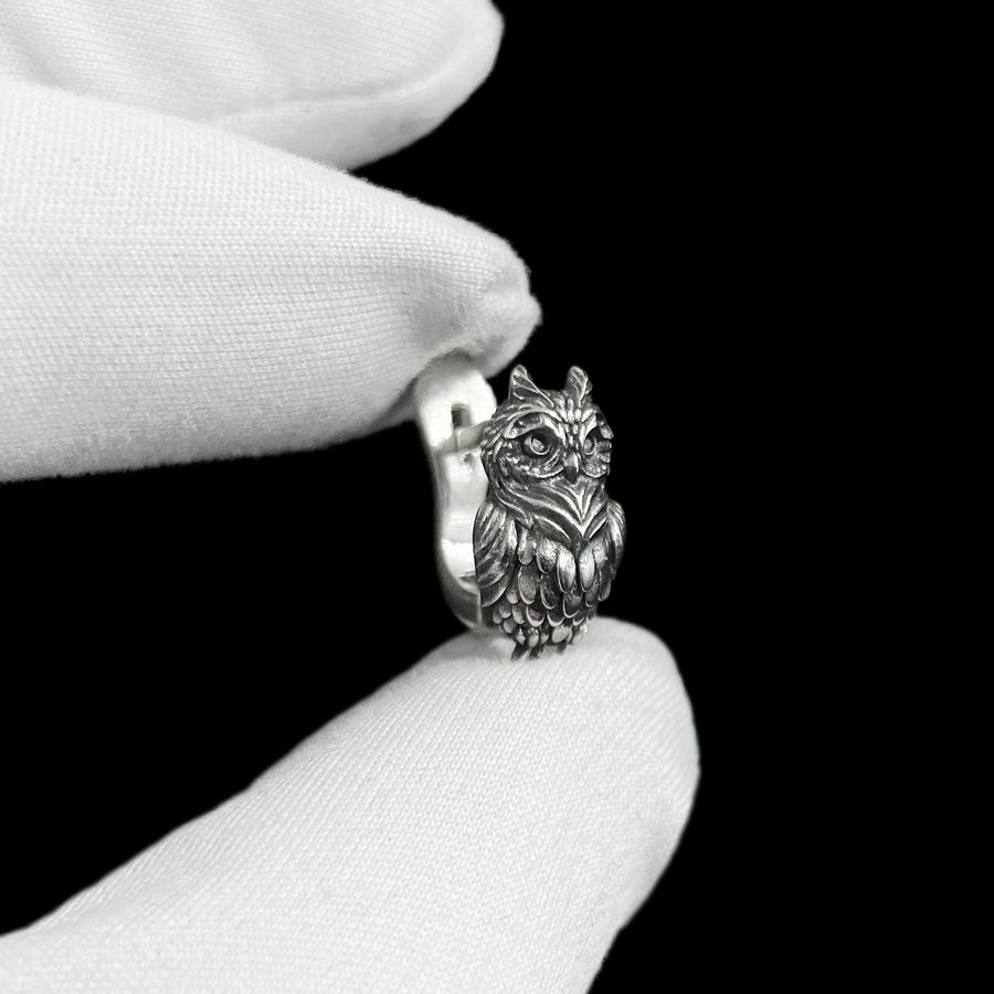 These sterling silver owl stud earrings embody quiet wisdom and natural elegance, crafted with intricate feather detailing that brings each tiny owl to life. Designed for those who feel connected to nature and symbolism, they offer a subtle yet meaningful statement you can wear every day. (etsy image id: 8029379729)